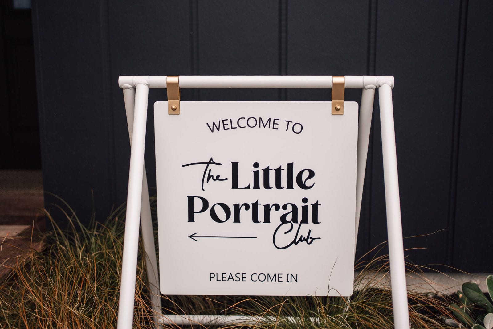 The Little Portrait Club welcome sign at the entrance to our Lincoln, Canterbury family portrait studio.
