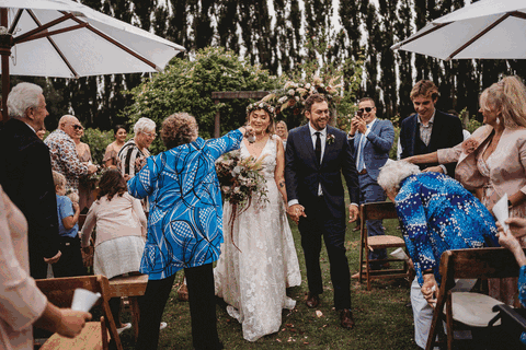 Confetti falling over a newly married couple