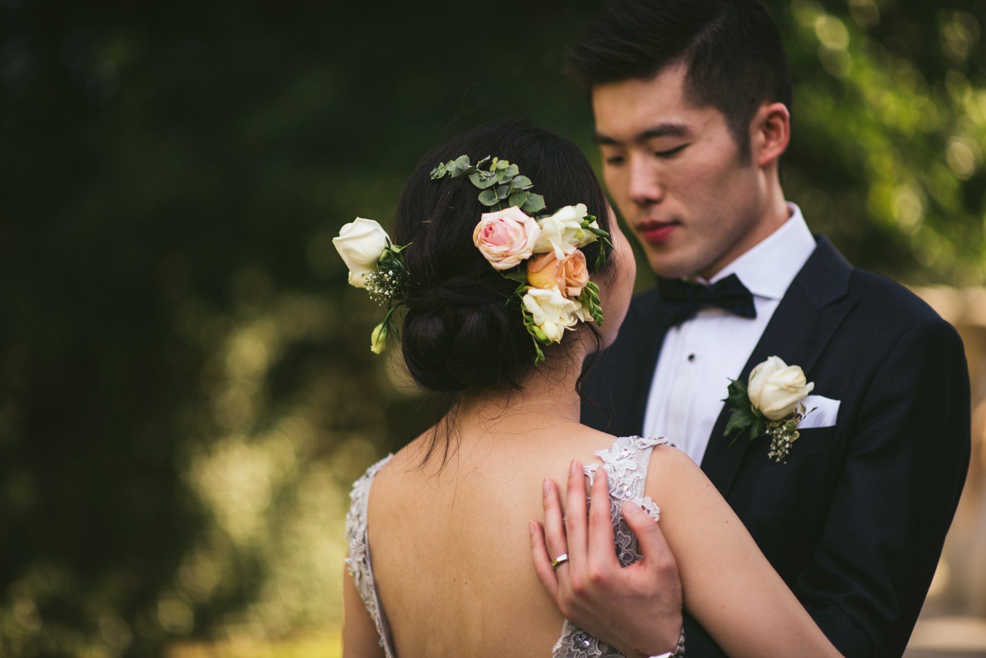 A bride in a flower crown laughing